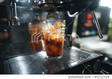 Closeup of hands barista make coffee Closeup of hands barista make coffee 93112529