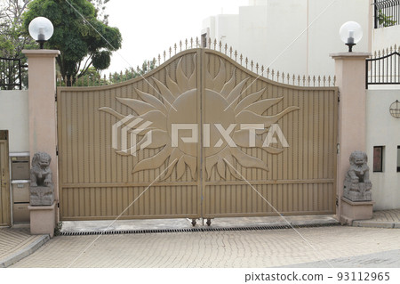 a Golden door gate , with sun pattern a Golden door gate , with sun pattern 93112965