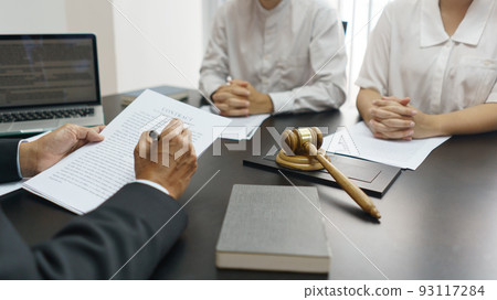 Concept of lawyer counseling, Senior lawyer explains the divorce agreement and contract to couple Concept of lawyer counseling, Senior lawyer explains the divorce agreement and contract to couple 93117284