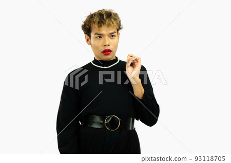 Young asian gay man with surprise expression in a black dress. Transgender isolated on white background. LGBTQ+ concept. 93118705