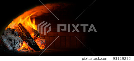 Fire wood burning in the oven 93119253