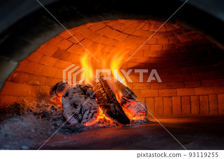 Fire wood burning in the oven 93119255