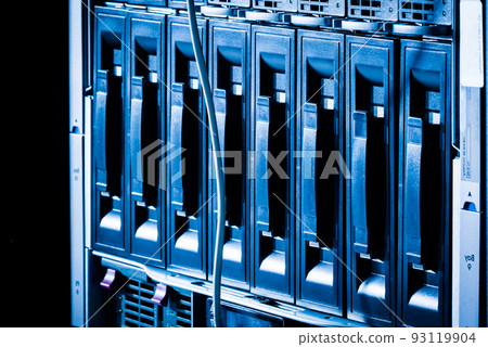Row of hard drives serving as data storage inside server room 93119904