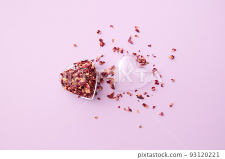 Heart-shaped pendant full of rose petals. Heart-shaped pendant full of rose petals. 93120221