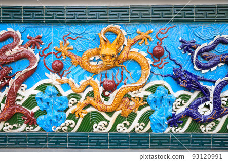 Yellow dragon on blue background, ceramics. Nine-Dragon Wall at Garden of Friendship, St. Petersburg, Russia. This is copy of the wall in Shanghai. 93120991