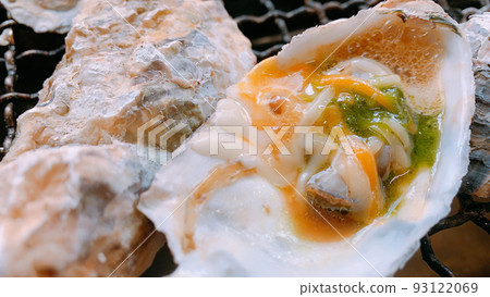 Grilled oysters arranged in Italian style 93122069