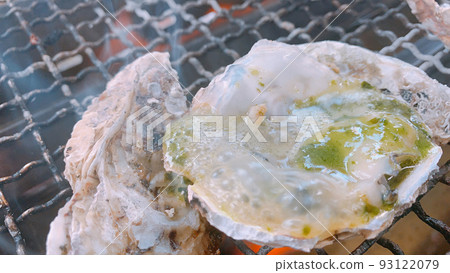 Grilled oysters arranged in Italian style 93122079