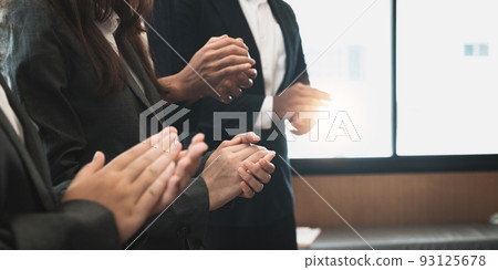 Photo of partners clapping hands after business seminar. Professional education, work meeting, presentation or coaching concept 93125678