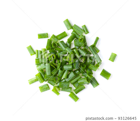 Chopped green onions on white 93126645
