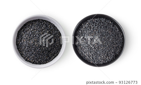 Sesame in a bowl isolated on white background 93126773