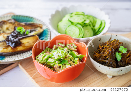 A table full of summer vegetables 93127970