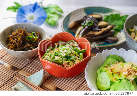 A table full of summer vegetables 93127974