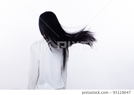 Black Straight Long Black Hair woman throw fly in air with fashion stylish and fun joy. Female turn back wear white shirt express emotion happy by blow wind hair, isolated white background Black Straight Long Black Hair woman throw fly in air with fashion stylish and fun joy. Female turn back wear white shirt express emotion happy by blow wind hair, isolated white background 93128647