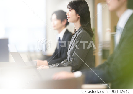 Young business people attending a seminar Young business people attending a seminar 93132642
