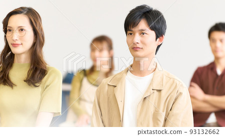 A young man attending a seminar with an enthusiastic expression A young man attending a seminar with an enthusiastic expression 93132662