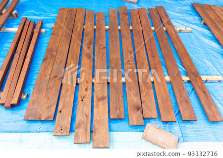 Wood lined up to paint and dry for do-it-yourself Wood lined up to paint and dry for do-it-yourself 93132716