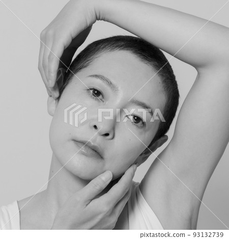 Portrait square of a middle-aged woman with a very short hairstyle 93132739