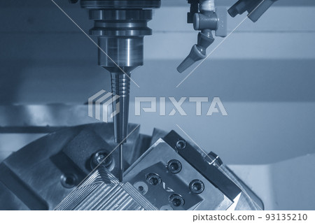 The 5-axis CNC milling machine  cutting the metal mold part. 93135210