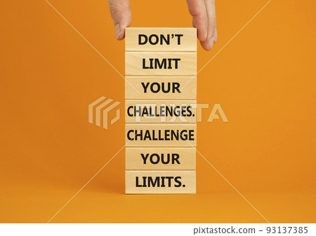 Do not limit your challenges symbol. Wooden blocks with words Do not limit your challenges. Challenge your limits. Beautiful orange background, copy space. Businessman hand. Business concept. Do not limit your challenges symbol. Wooden blocks with words Do not limit your challenges. Challenge your limits. Beautiful orange background, copy space. Businessman hand. Business concept. 93137385