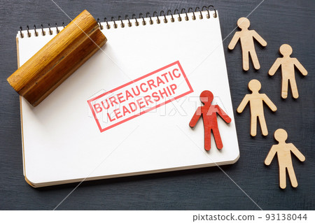 Stamp bureaucratic leadership on the page, and figurines. 93138044