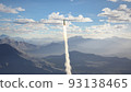 Rocket fly on mountains background 93138465