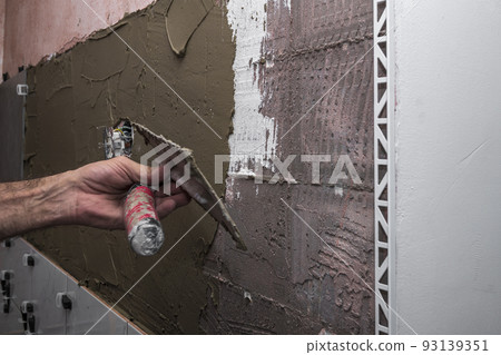 adhesive, architecture, bathroom, bathroom renovation, builder, building, cement, ceramic tile laying, ceramic wall tiles, concrete, construction, construction worker, contractor, cuts tile, decoratio adhesive, architecture, bathroom, bathroom renovation, builder, building, cement, ceramic tile laying, ceramic wall tiles, concrete, construction, construction worker, contractor, cuts tile, decoratio 93139351