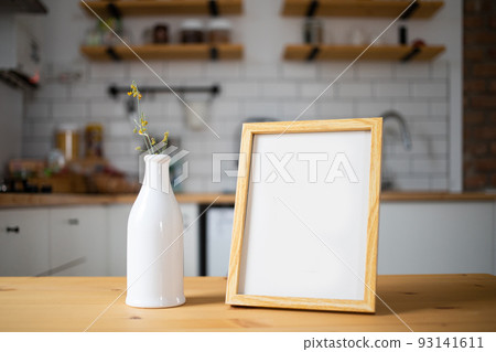 empty frame on modern kitchen table mock up space for your text empty frame on modern kitchen table mock up space for your text 93141611