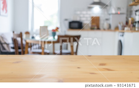 empty wooden tabletop and blurred kitchen mock up for product display 93141671