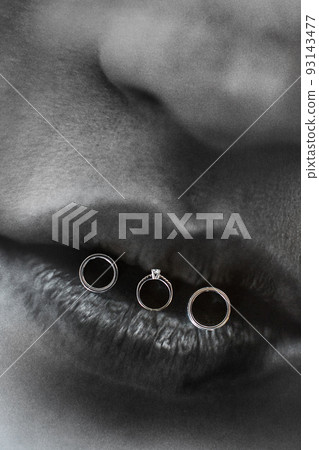 Three wedding rings on the lips. Wedding day Three wedding rings on the lips. Wedding day 93143477