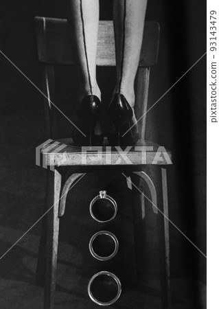 Three wedding rings under the chair. Wedding day Three wedding rings under the chair. Wedding day 93143479