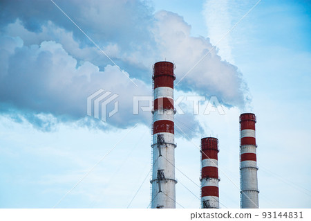 Air pollution. Smoking chimneys against blue sky. Air pollution. Smoking chimneys against blue sky. 93144831
