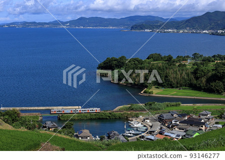 Omura Line train running along Omura Bay Omura Line train running along Omura Bay 93146277