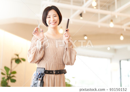 Hair stylist looking at you with a smile 93150152
