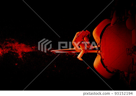Red Space suits isolated on space background. Elements of this image furnished by NASA. 93152194