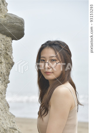 Shoot a portrait of a woman in her twenties on the coast of Otobe, Hokkaido in summer Shoot a portrait of a woman in her twenties on the coast of Otobe, Hokkaido in summer 93153293