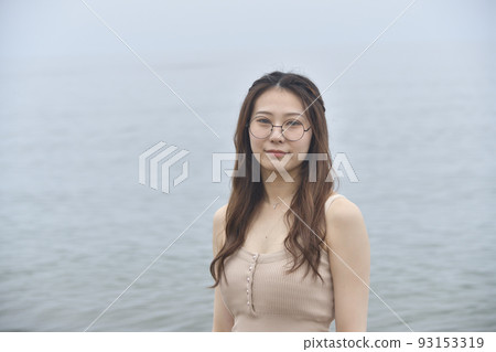 Shoot a portrait of a woman in her twenties on the coast of Otobe, Hokkaido in summer Shoot a portrait of a woman in her twenties on the coast of Otobe, Hokkaido in summer 93153319