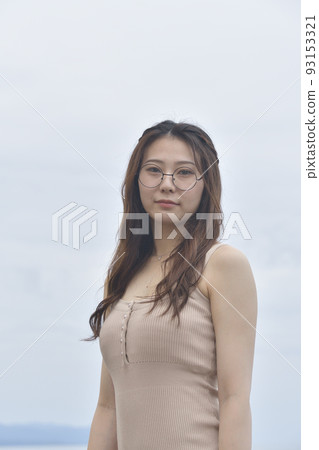 Shoot a portrait of a woman in her twenties on the coast of Otobe, Hokkaido in summer Shoot a portrait of a woman in her twenties on the coast of Otobe, Hokkaido in summer 93153321