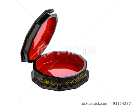 figured Black and red lacquered wooden casket with golden floral pattern on white background. Empty open casket for storing accessories, small items, valuables and jewelry. Luxury gift packaging. 93154287