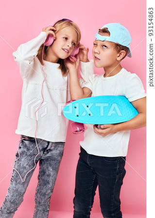 Stylish young friends active rest entertainment pink color background Stylish young friends active rest entertainment pink color background 93154863