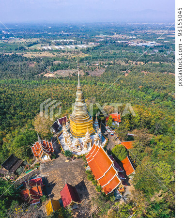 Aerial view of Wat Phra Phutthabat Tak Pha temple on top of the mountain in Lamphun, Thailand 93155045