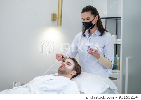 Young man spending time in the beauty salon Young man spending time in the beauty salon 93155214