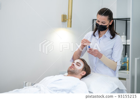 Young man spending time in the beauty salon 93155215