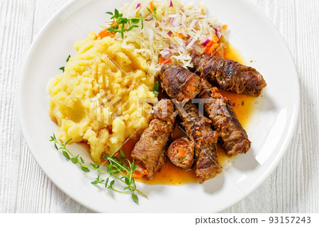 beef rouladen with potato mash and sauerkraut beef rouladen with potato mash and sauerkraut 93157243