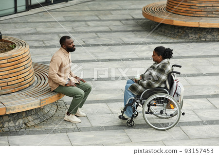 Black Woman with Disability in City Setting Black Woman with Disability in City Setting 93157453