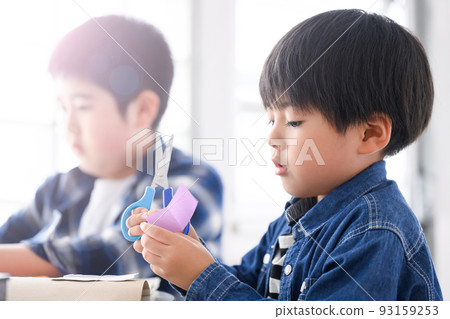 Boys studying and doing crafts Lower grades 93159253