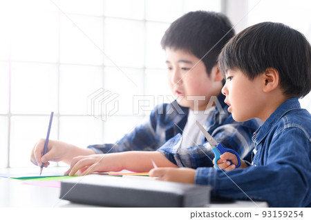 Boys studying and doing crafts Lower grades 93159254