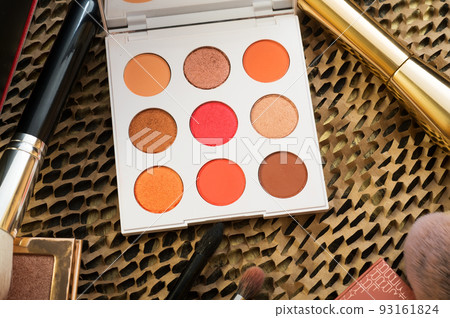 fashion set of new cosmetics palettes with brushes. close up fashion set of new cosmetics palettes with brushes. close up 93161824