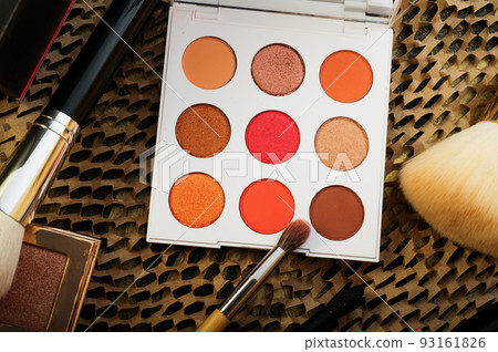 fashion set of new cosmetics palettes with brushes. close up fashion set of new cosmetics palettes with brushes. close up 93161826