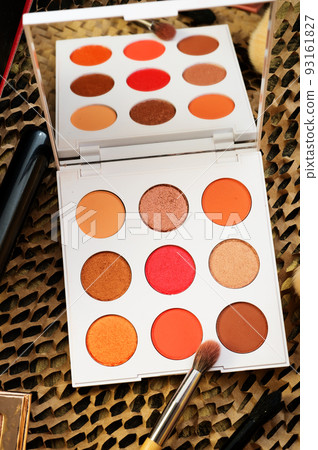 fashion set of new cosmetics palettes with brushes. close up fashion set of new cosmetics palettes with brushes. close up 93161827