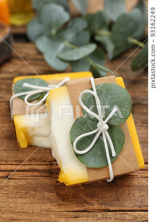 Natural handmade soap bars on wooden table Natural handmade soap bars on wooden table 93162249